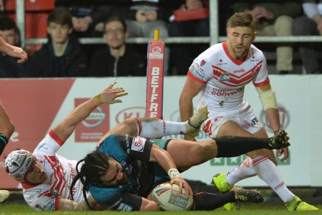 Konrad Hurrell scores Leeds Rhinos' second try at St Helens.