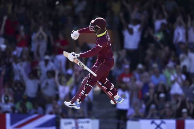 West Indies' Shimron Hetmyer celebrates after he scored a century against England at the Kensington Oval. Picture: AP/Ricardo Mazalan