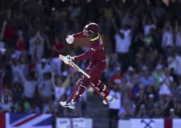 West Indies' Shimron Hetmyer celebrates after he scored a century against England at the Kensington Oval. Picture: AP/Ricardo Mazalan