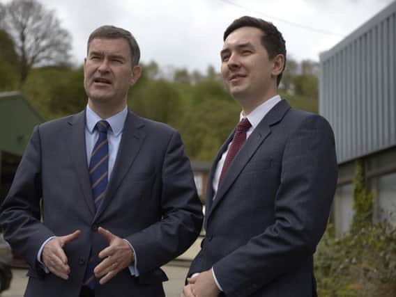 Former offender Jacob Hill, right, who set up the community interest company Offploy, was visited by Justice Secretary David Gauke last year.