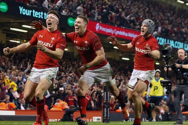 Wales' Josh Adams celebrates scoring his side's clinching try (Paul Harding/PA Wire)