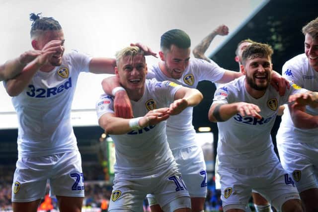 Leeds United players celebrate Gjanni Alioski's goal.