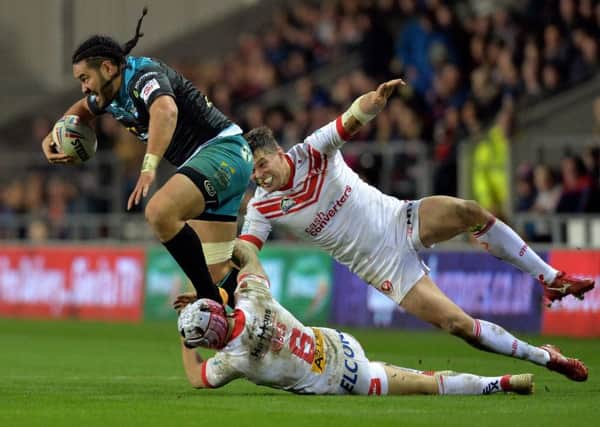 Konrad Hurrell gets away from Theo Fages and Louie McCarthy-Scarsbrook.  Picture: Bruce Rollinson