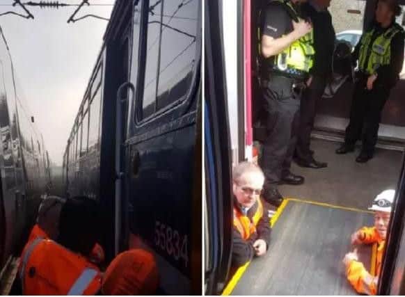 British Transport Police helping Network Rail get passengers off a train near Kirkstall. (Photo: British Transport Police West Yorkshire)