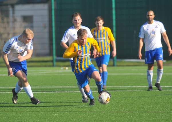 Callum Walker, of Horsforth St Margaret's, races clear during his side's 2-1 Old Boys' Shield quarter-final win at Leeds City. PIC: Steve Riding