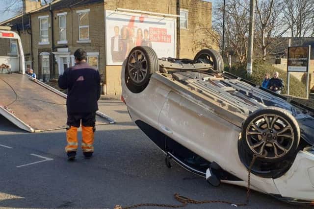 Overturned car in Chapeltown in Pudsey. Photo credit: West Yorkshire Police
