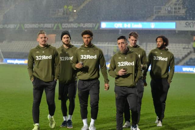 Leeds United squad arrive at Loftus Road.