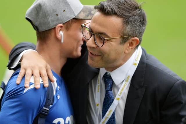 Leeds United owner Andrea Radrizzani embraces Gjanni Alioski.