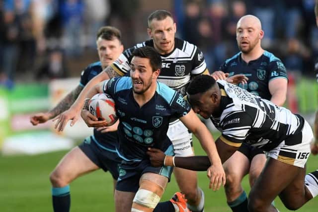 Holmes in action for Featherstone last season.