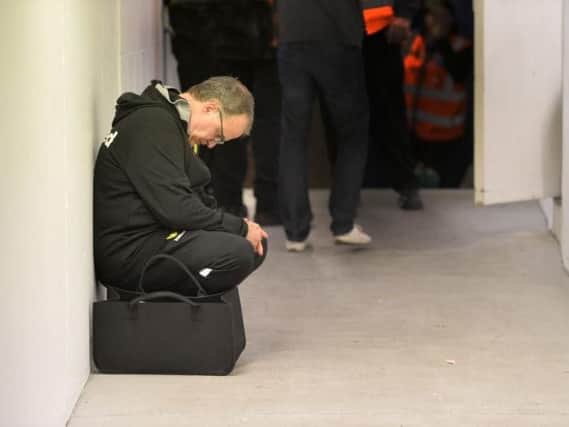 Leeds United head coach Marcelo Bielsa outside the away dressing room at Loftus Road on Tuesday.