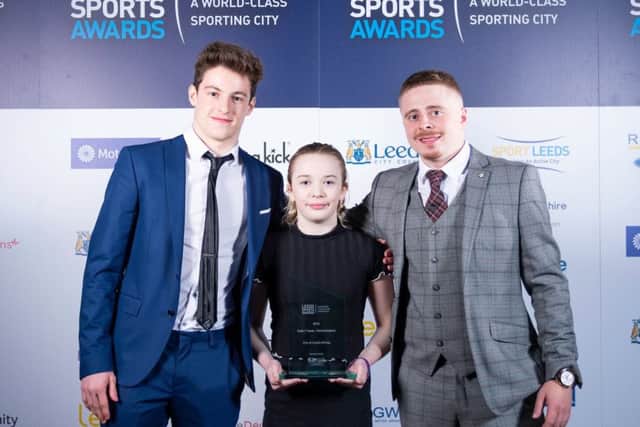 Members of the City of Leeds Diving Club show off the club/team performance of the year award.