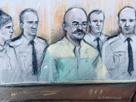 Bronson's supporters say it was unfair the notorious prisoner had to wear a yellow and green prison uniform in front of the jury