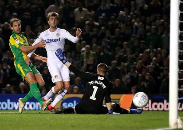 Leeds United's Patrick Bamford (centre) scores his side's second goal against West Brom.