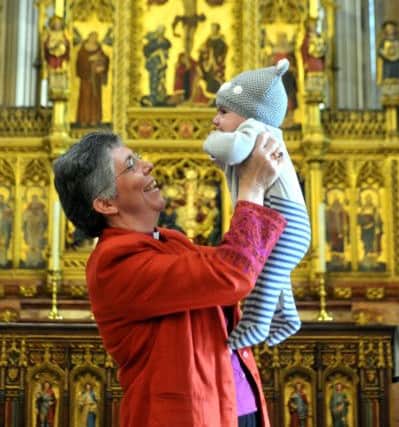 CELEBRATION: Bishop Francis-Dehqani with baby Jesus Mohsen.