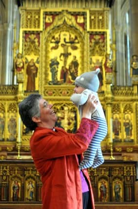 CELEBRATION: Bishop Francis-Dehqani with baby Jesus Mohsen.