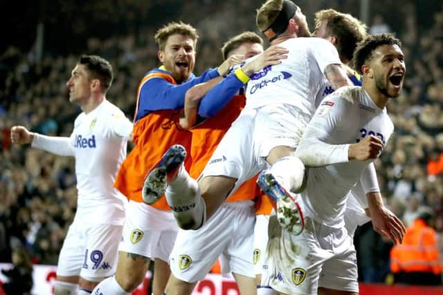 Leeds United's Patrick Bamford (second right) celebrates with team-mates after scoring his side's third goal against West Brom.