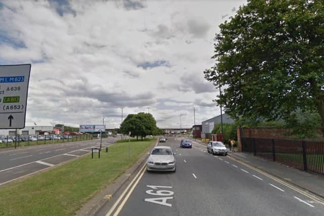 There is heavy traffic on Hunslet road, with cars stuck at standstill.