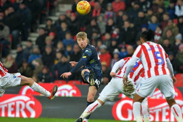 Jack Clarke shoots at goal during Leeds United's 2-1 defeat to Stoke City in January. The winger is back in full training after his health scare.