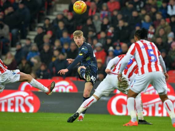 Jack Clarke shoots at goal during Leeds United's 2-1 defeat to Stoke City in January. The winger is back in full training after his health scare.