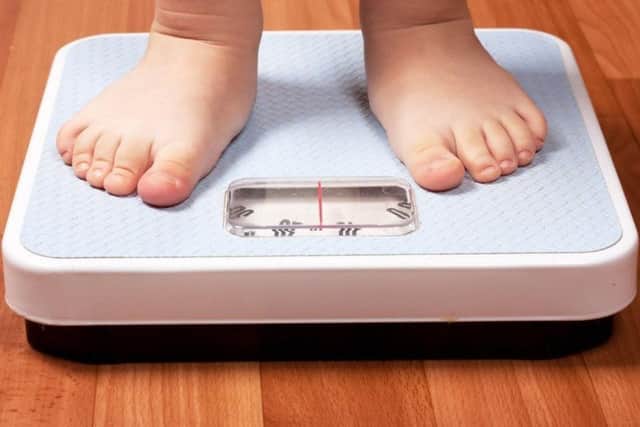 Childhood obesity in Leeds is going down, one report claims.