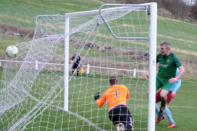 Sean Jeavons scores the second goal against Rawdon to make it 2-2 before Beeston went on to win it 3-2. PIC: Steve Riding