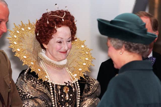 Una Stubbs, in a costume of Queen Elizabeth 1, meets Queen Elizabeth 2 during her visit to Leeds for the opening of The Royal Armouries on the 15th March 1996.