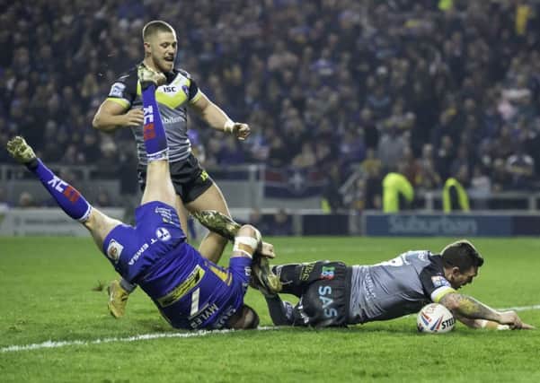 Wakefield's Danny Brough touches down against Leeds.