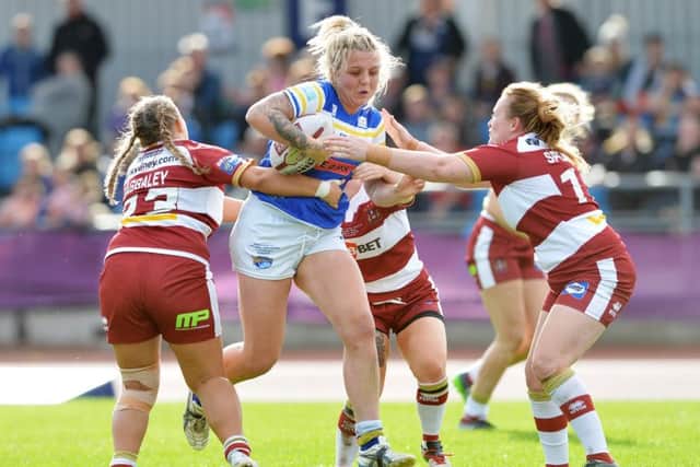 Rhiannon Marshall on the attack for Leeds Rhinos is last year's Women's Super League Grand Final against Wigan.