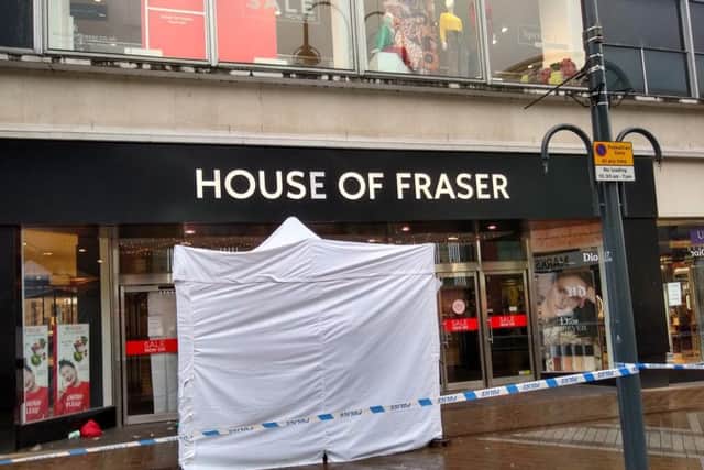 The police tent outside House of Fraser in Briggate.
