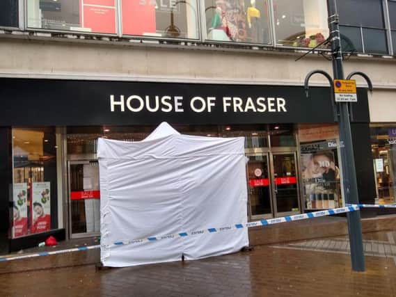 The police tent outside House of Fraser in Briggate.