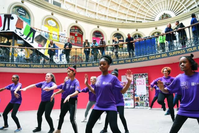This Girl Can members take part in a flashmob at the Corn Exchange in Leeds.