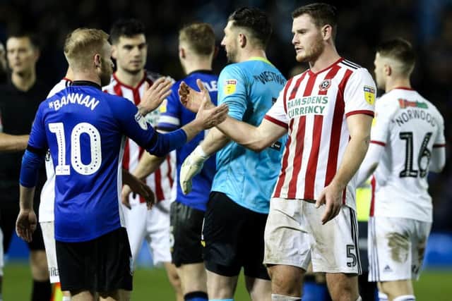Barry Bannan of Sheffield Wednesday and Jack O'Connell of Sheffield United shake hands after goalless Steel City derby.