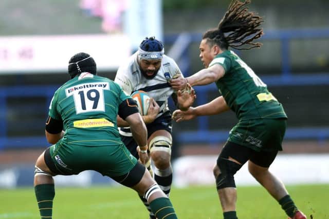 Path blocked: Yorkshire Carnegies Faatiga Lemalu is tackled by London Irishs Ofisa Treviranus and TJ Ioane. (Picture: Jonathan Gawthorpe)