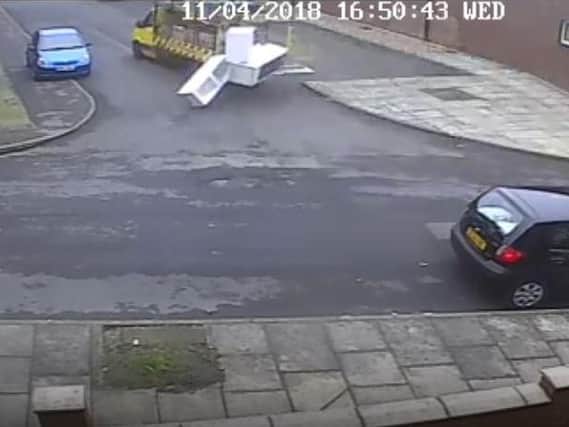 The moment the fridges fell from the back of the van in Harehills