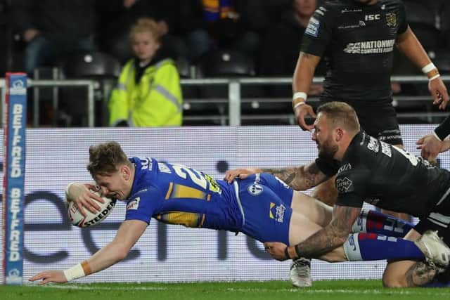 Harry Newman touches down against Hull FC.