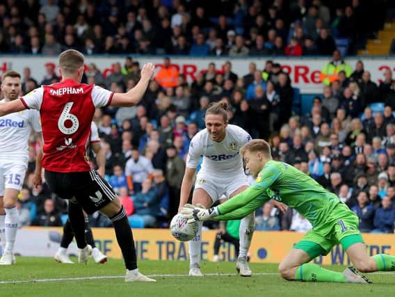 Bailey Peacock-Farrell and Luke Ayling thwart Chris Mepham during Leeds United's 1-1 draw with Brentford at Elland Road in October.