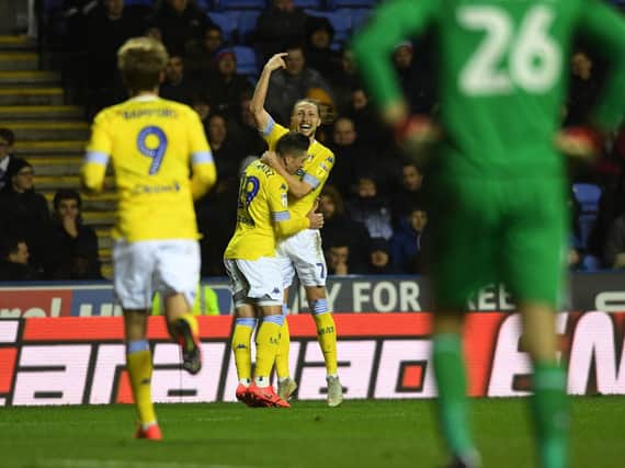Luke Ayling celebrates with Pablo Hernandez after the midfielder gave Leeds United a 3-0 advantage at Reading.