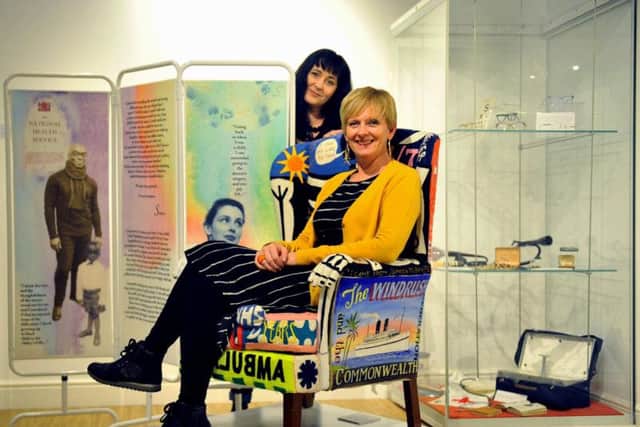Artists Jelena Zindovic (left) and Jane Moorland with an appliqued chair and hospital screen which showcases peoples stories of the NHS part of a new ecxhibition at the Thackray Medfical Museum in Leeds.