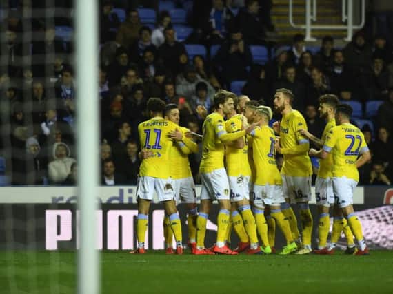 Leeds United players celebrate at Reading.