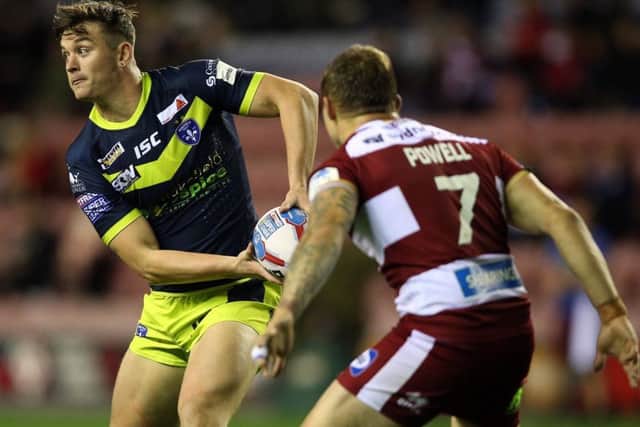 Wigan Warriors' Sam Powell (right) and Wakefield Trinity's Jordan Crowther.