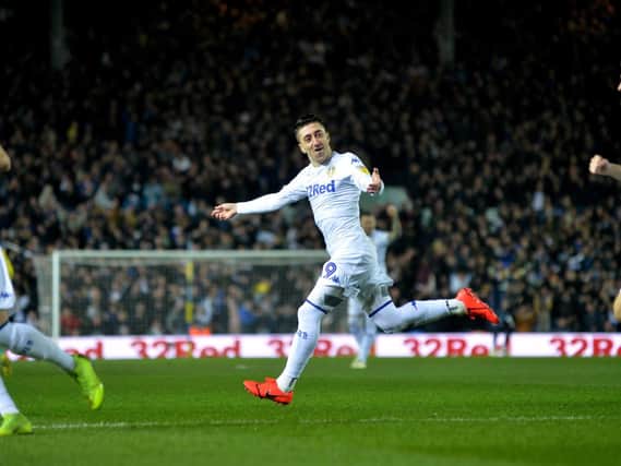 ADMIRER: Mateusz Klich, right, heads to celebrate with Leds United team mate Pablo Hernandez after his stunning early strike in the 4-0 win against West Brom.