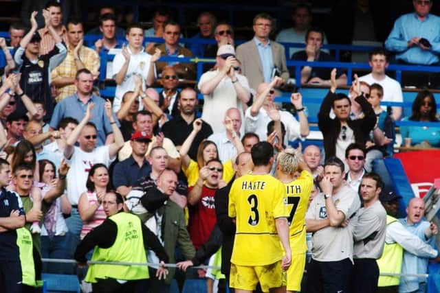 Leeds United fans applaud Alan Smith and Ian Harte at Stamford Bridge on May 15, 2004 - Leeds' last Premier League game which Chelsea won 1-0. Picture: PA.