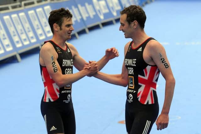 WELL DONE: Jonny Brownlee congratulates brother Alistair for winning the Elite Men's Race in Leeds in 2017. Picture: Tony Johnson.