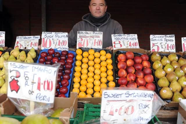 Shaun Dolan with the stall that has been in his family for more than 70 years and now faces being re-located.