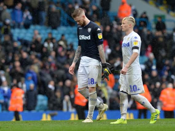 Leeds United's Pontus Jansson and Gjanni Alioski dejected at full-time.