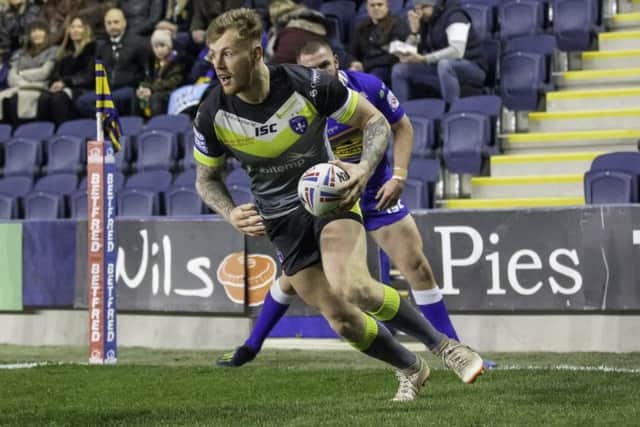 Tom Johnstone scores one of his three tries against Leeds Rhinos earlier this month. Picture by Isabel Pearce/SWpix.com.