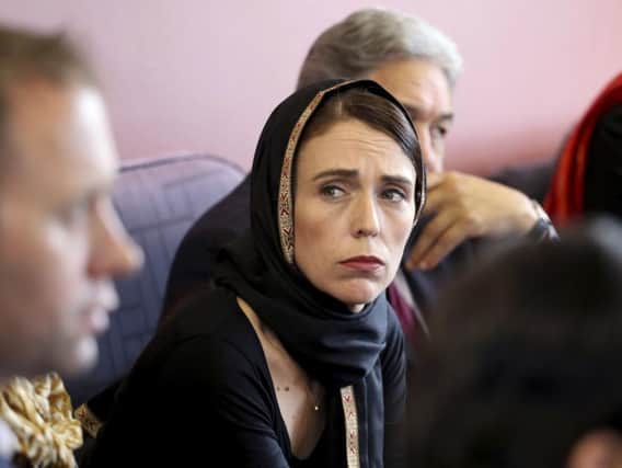 In this photo released by New Zealand Prime Minister's Office, Prime Minister Jacinda Ardern, meets representatives of the Muslim community.