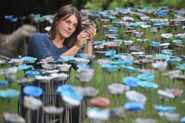 DISPLAY: Ceramic artist Anna Whitehouse assembling the Swarm installation at Skelton Grange in August 2017. Picture Tony Johnson.