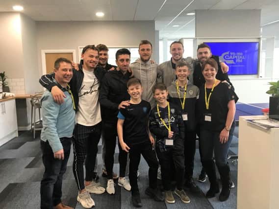 Tom Atkinson and family meet Leeds players Kalvin Phillips, Mateusz Klich, Pablo Hernandez, Liam Cooper, Luke Ayling and Stuart Dallas.
