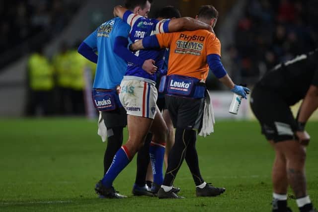 Wakefield's Bill Tupou leaves the field at Hull injured but is likely return sooner than first expected. PIC: Matthew Merrick